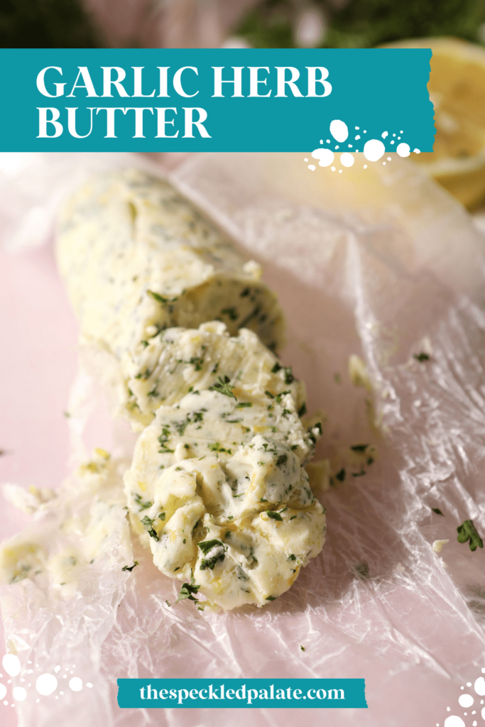 Slices of compound butter on wax paper with the text garlic herb butter