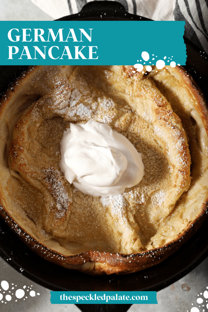 Close up of a baked Dutch baby pancake with whipped cream with the text German Pancake