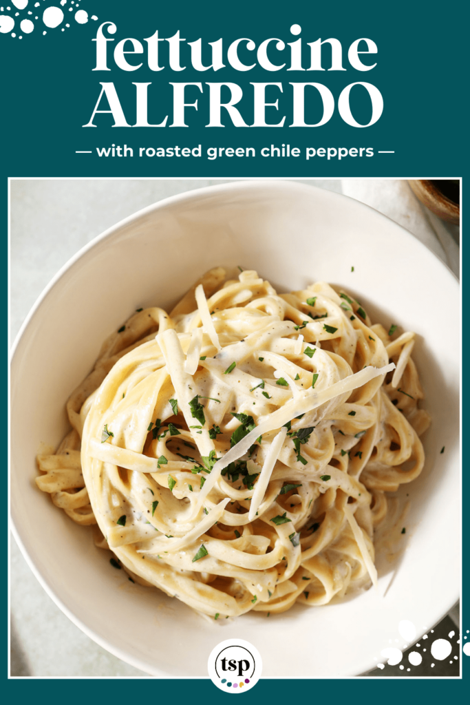 Close up of a bowl of long thin pasta noodles in a creamy sauce with the text fettuccine Alfredo with roasted green Chile peppers