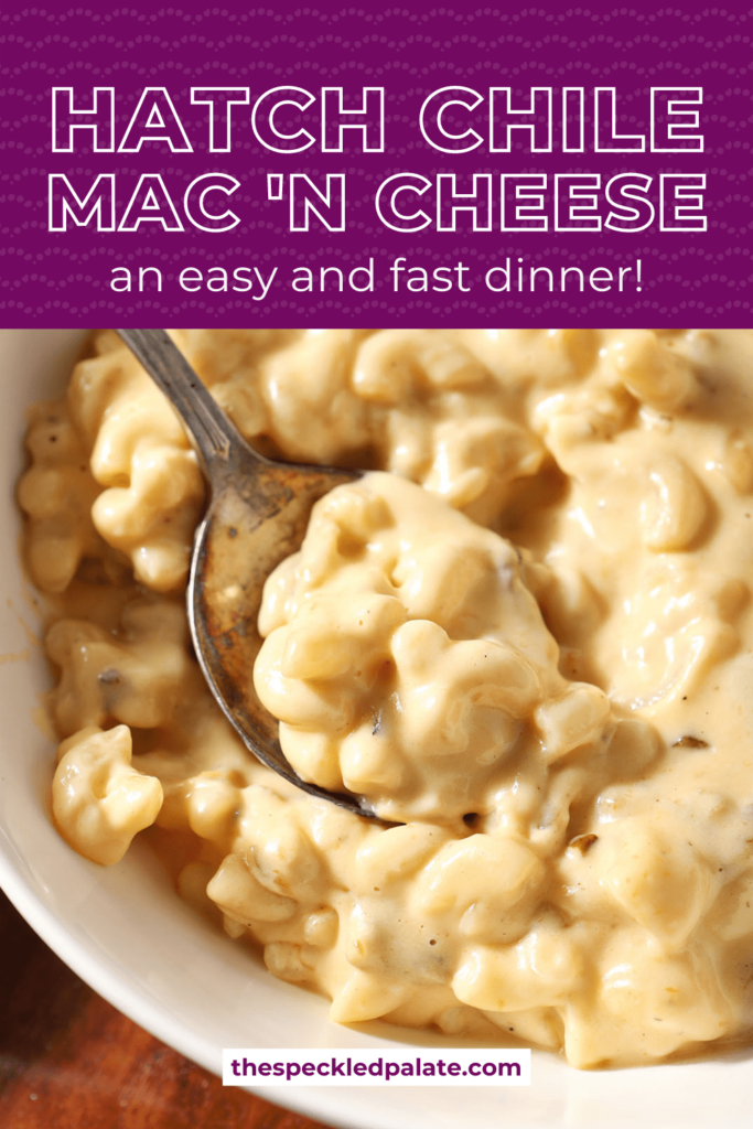 A spoon sits in a bowl of macaroni and cheese with the text Hatch Chile Mac ’n cheese an easy and fast dinner