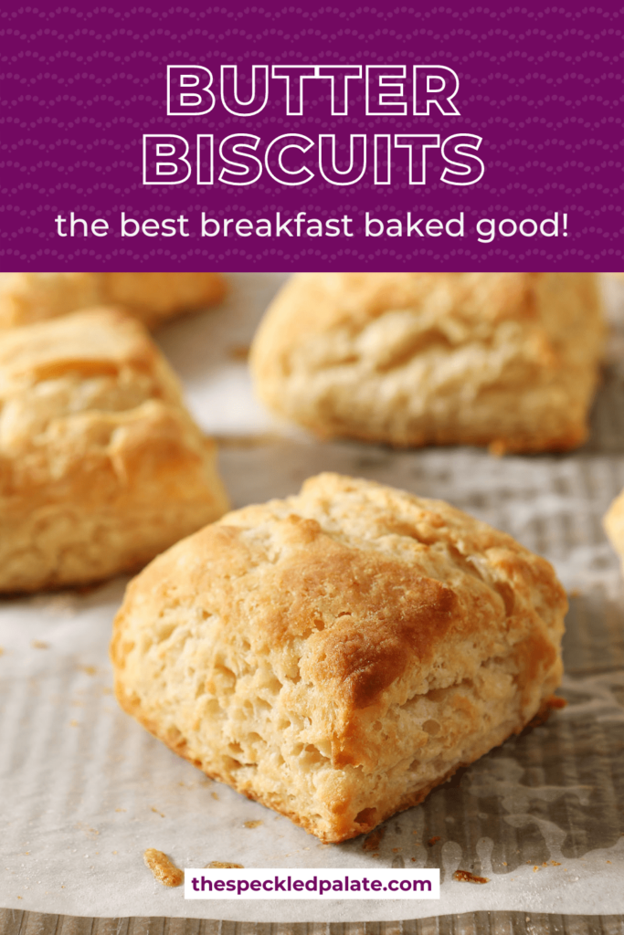 Baked butter biscuits on a baking sheet with the text Butter Biscuits the best breakfast baked good!