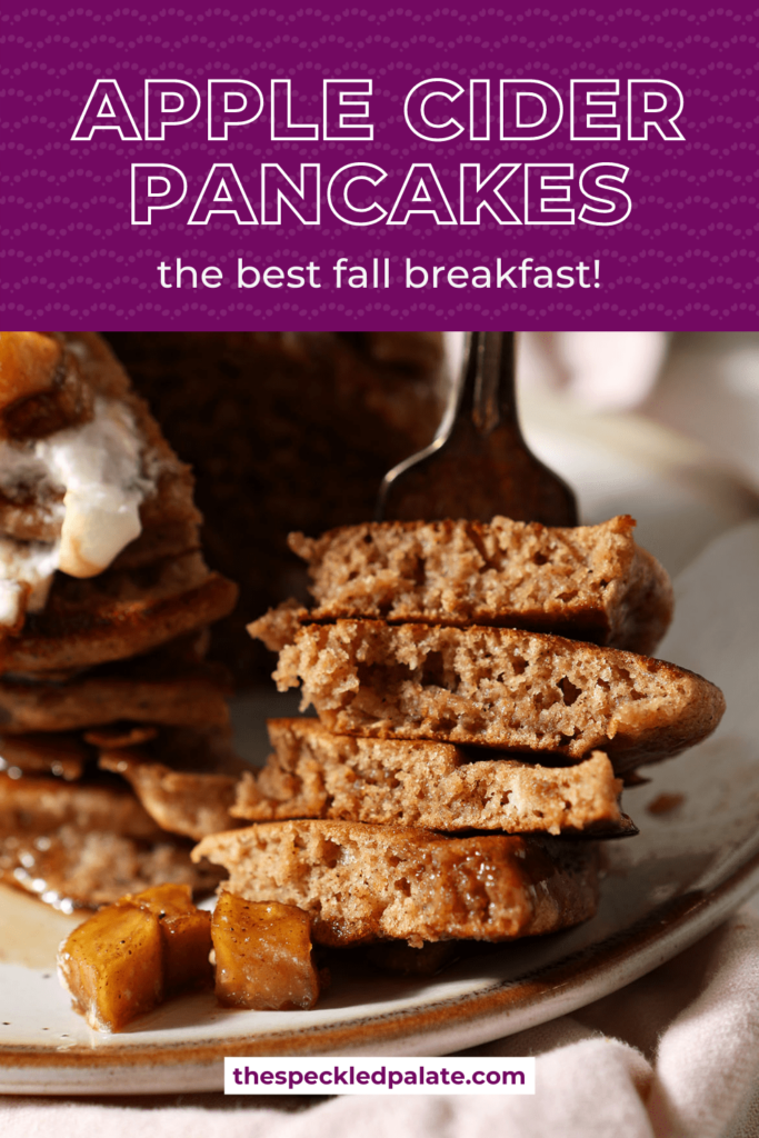 A fork holds a bite of fluffy pancakes next to a stack with the text apple cider pancakes the best fall breakfast