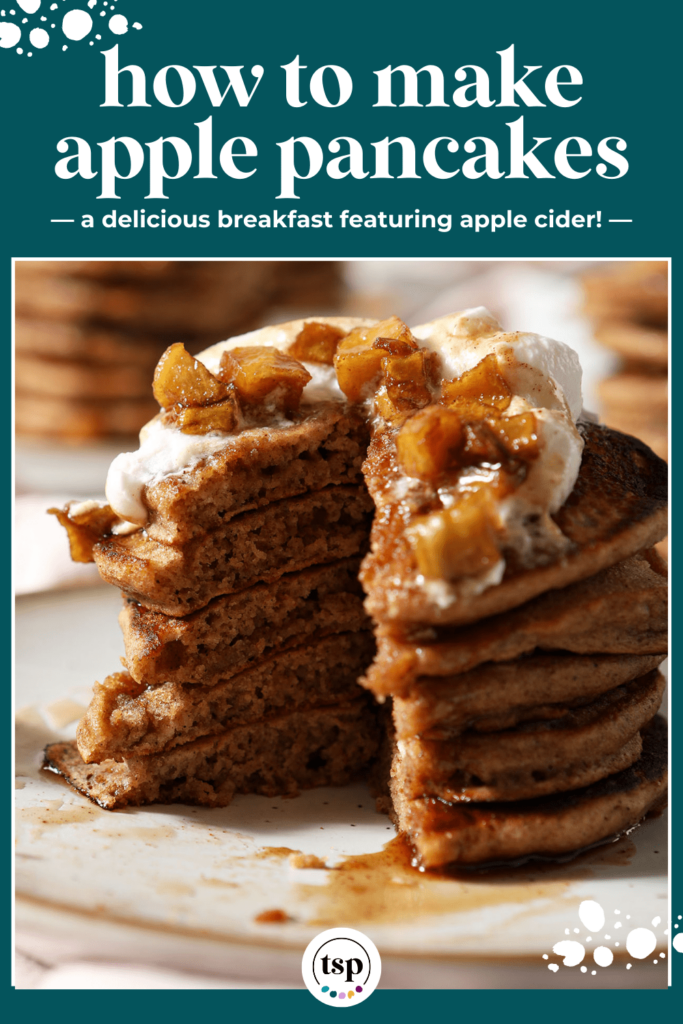 A cut-into stack of pancakes on a plate garnished with caramelized apples, whipped cream and syrup with the text how to make apple pancakes a delicious breakfast featuring apple cider!