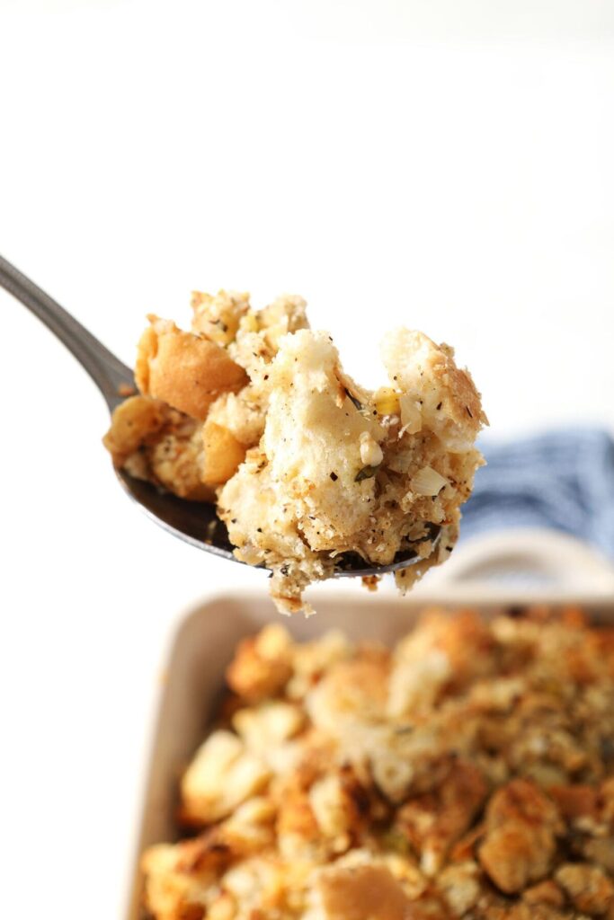 A spoon holds a helping of Sage Stuffing for turkey