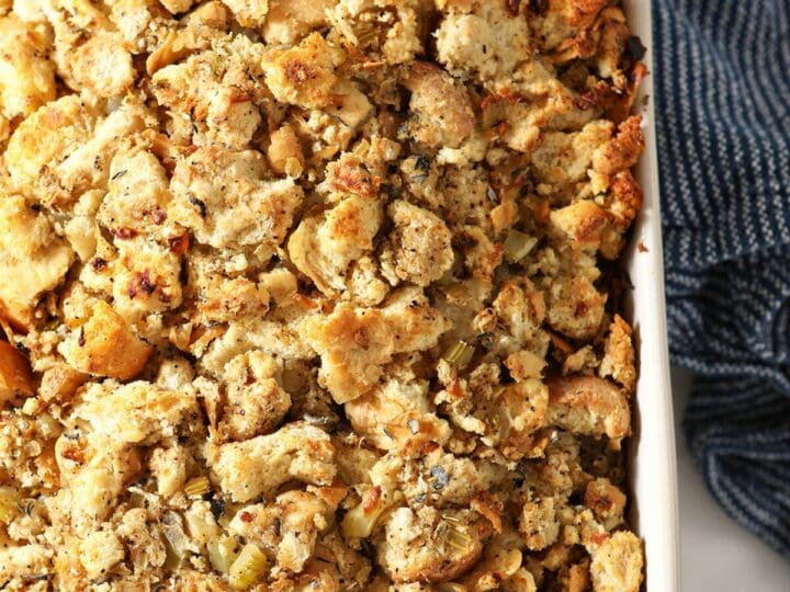 A casserole dish of golden brown stuffing