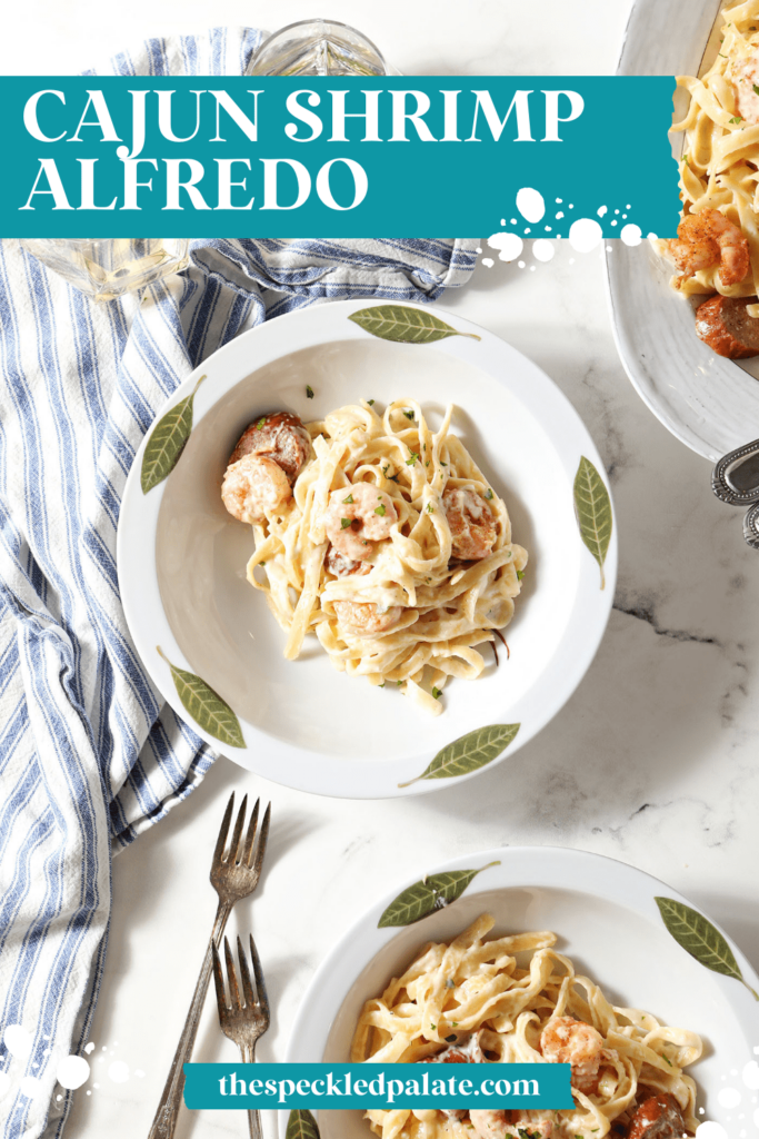 Three bowls of Shrimp Fettuccine Alfredo from above with the text Cajun Shrimp Alfredo