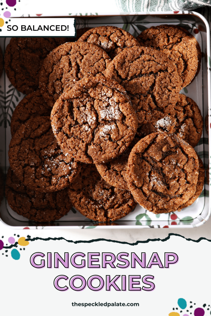 A cookie tin of sugar-coated ginger snap cookies with the text gingersnap cookies