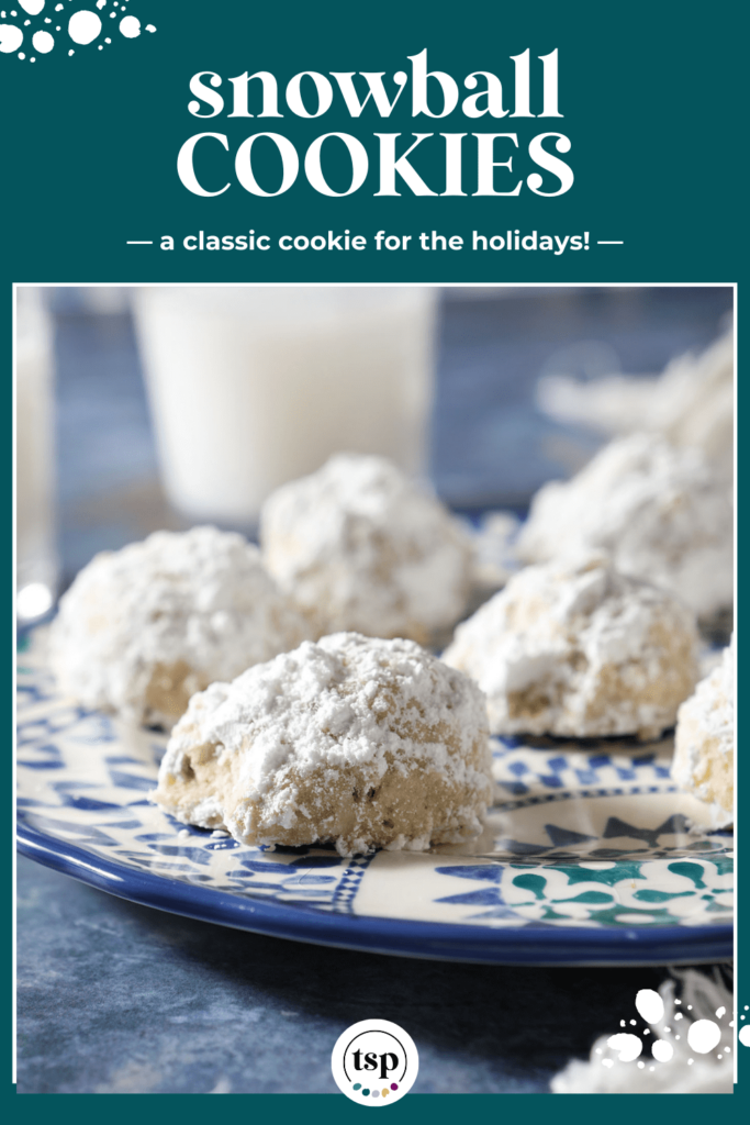 Cookies covered in powdered sugar on a blue plate with the text snowball cookies a classic cookie for the holidays