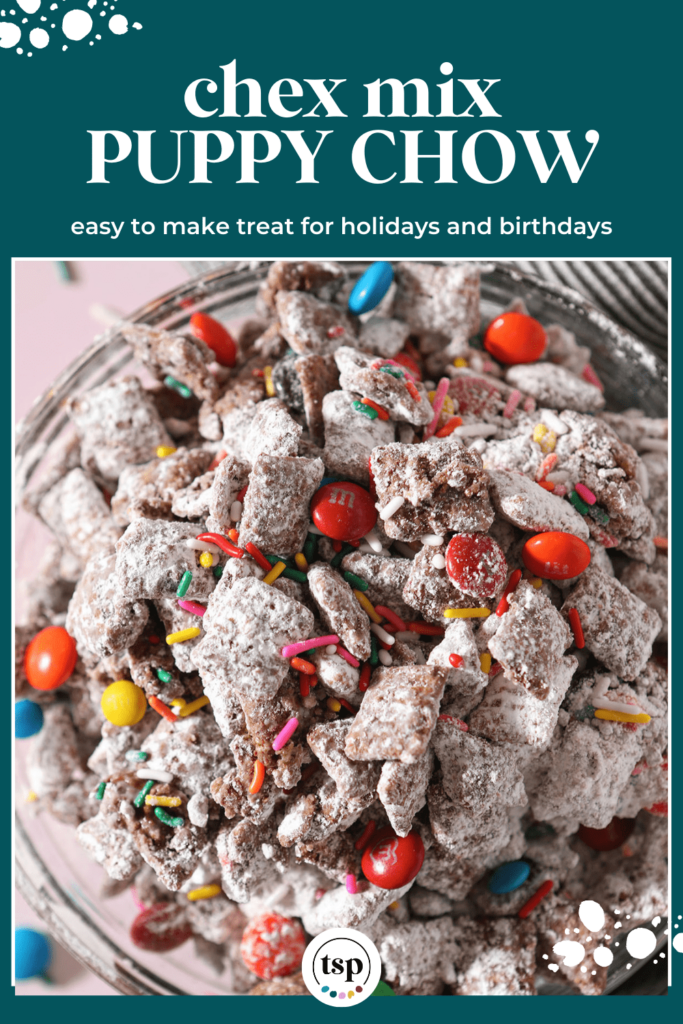 Close up of a bowl with rainbow sprinkles and chocolate-covered candies in Chex Mix Puppy Chow easy to make treat for holidays and birthdays