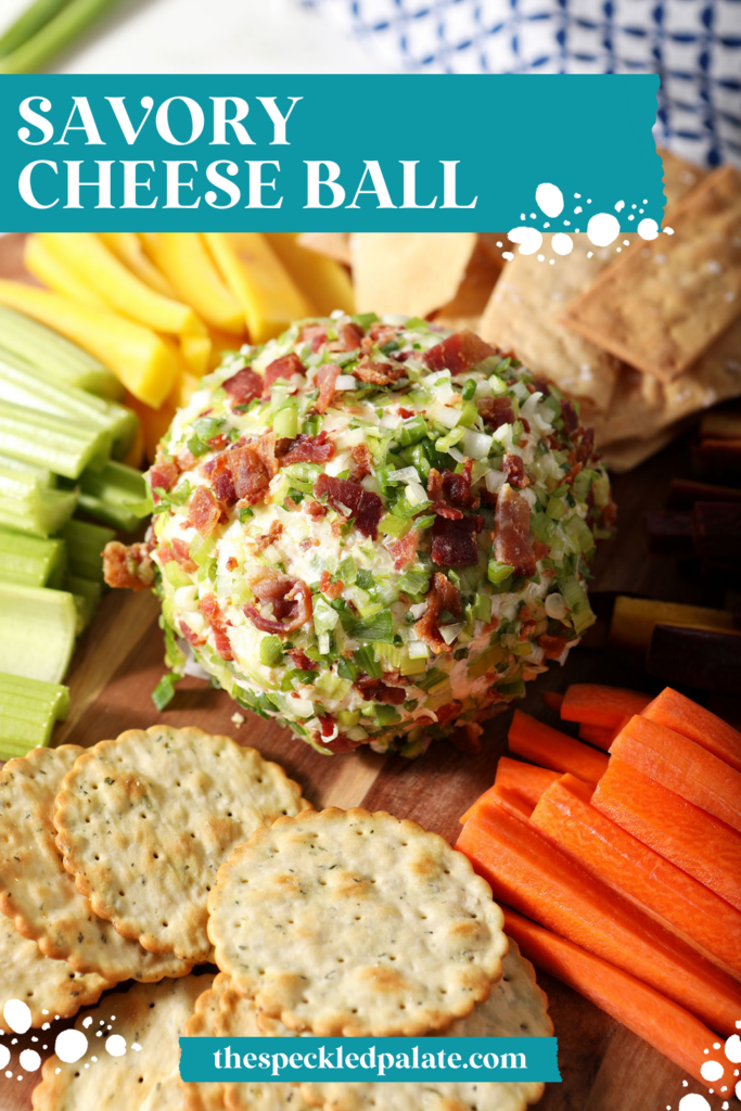 A cheeseball coated in green onions and bacon in the middle of a wooden board with crackers and raw vegetables with the text Savory Cheese Ball