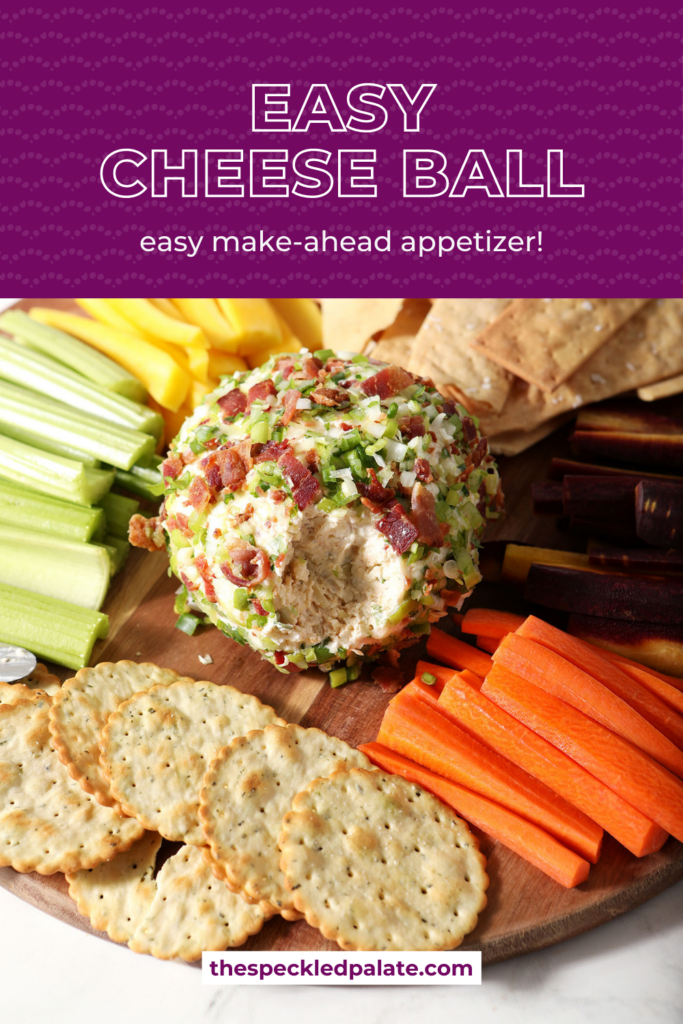 A cheeseball coated in green onions and bacon in the middle of a wooden board with crackers and raw vegetables with the text easy cheese ball easy make-ahead appetizer