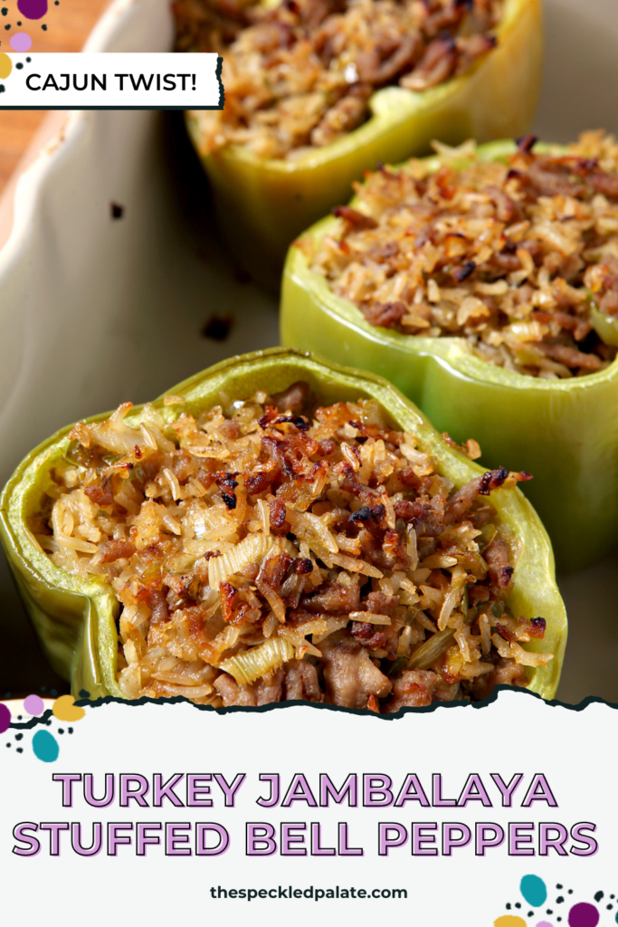 Close up of rice-filled green bell peppers with the text Turkey Jambalaya Stuffed Bell Peppers