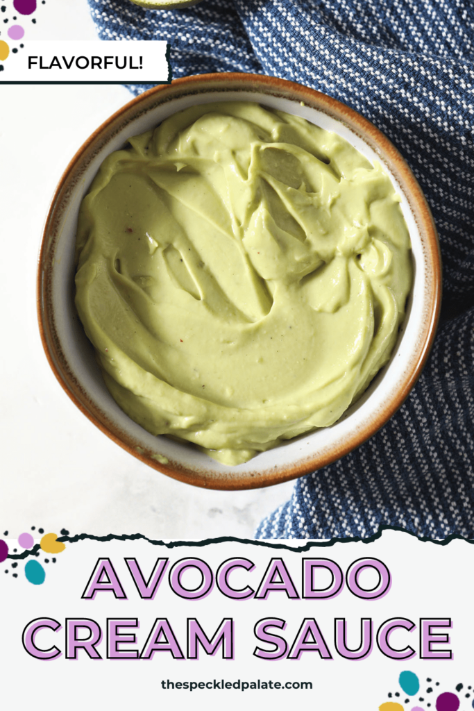 A bowl of avocado sauce from above on marble with a blue towel with the text Avocado Cream Sauce