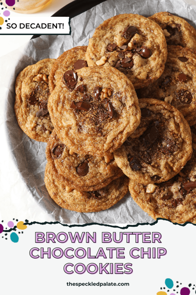 A plate of Browned Butter Chocolate Chip Cookies with Walnuts and Bourbon stacked on top of each other with the text Brown Butter Chocolate Chip Cookies