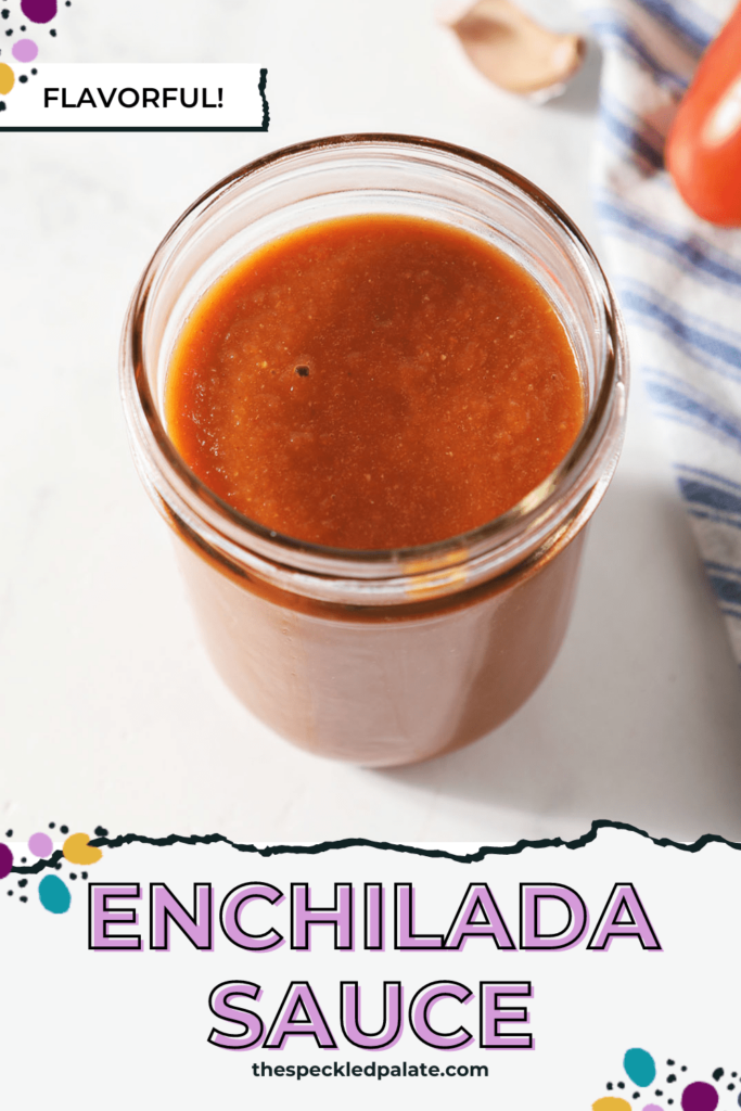 Overhead of a jar on marble with a blue striped towel with the text enchilada sauce