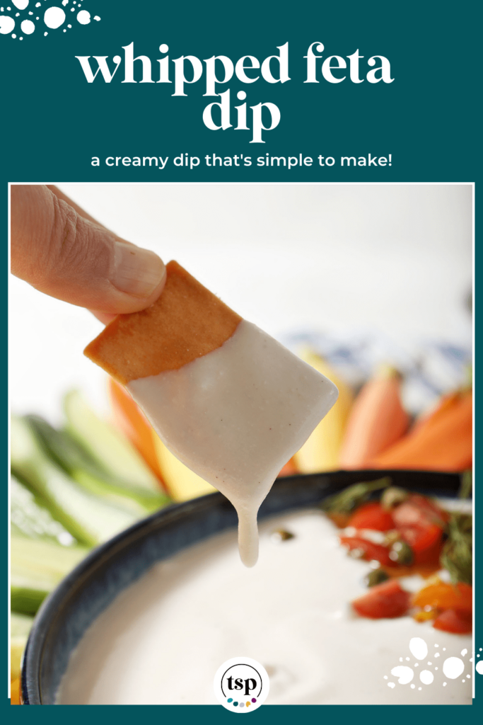 pinterest image of whipped feta dip on a pita cracker