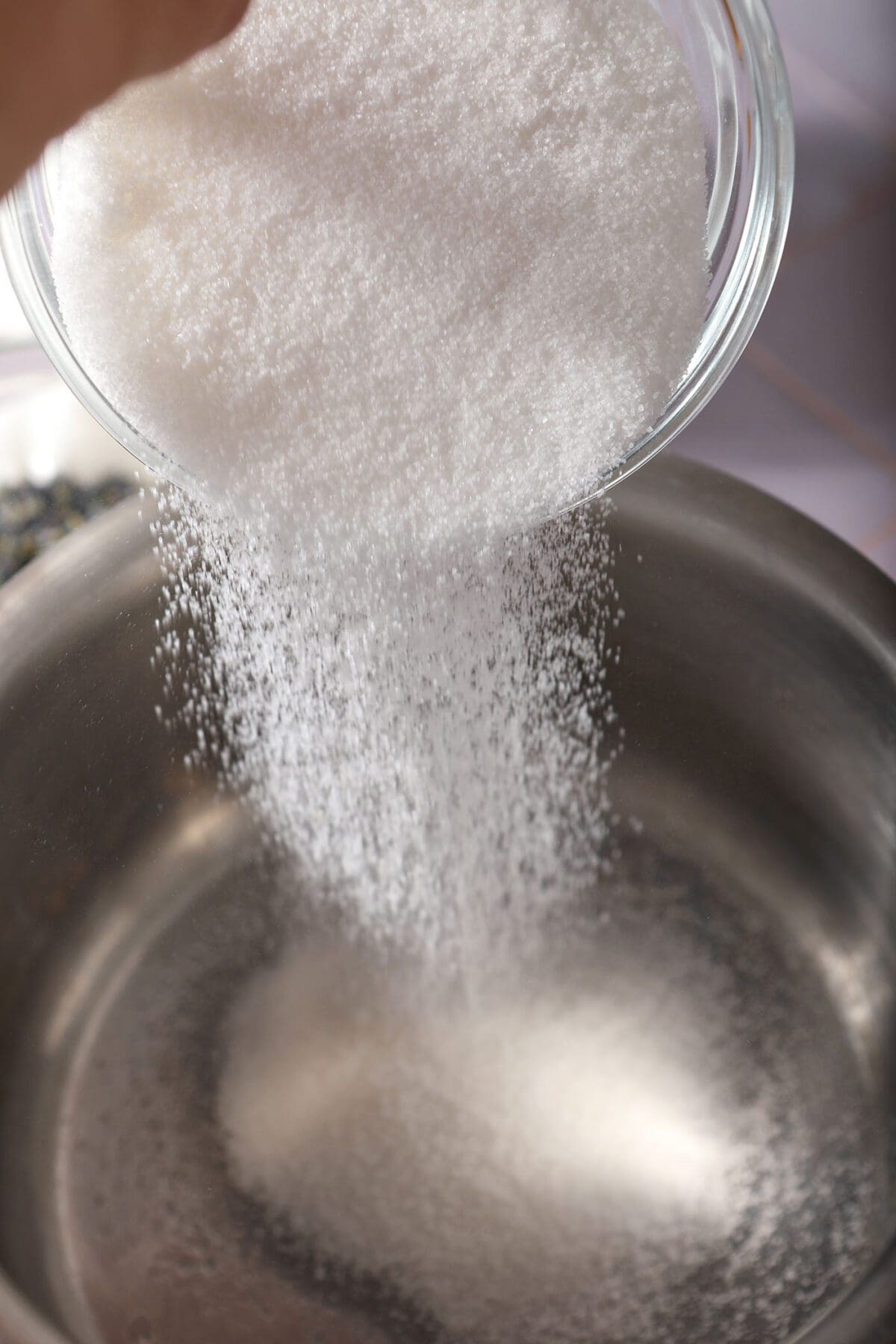 Sugar pours into a saucepan