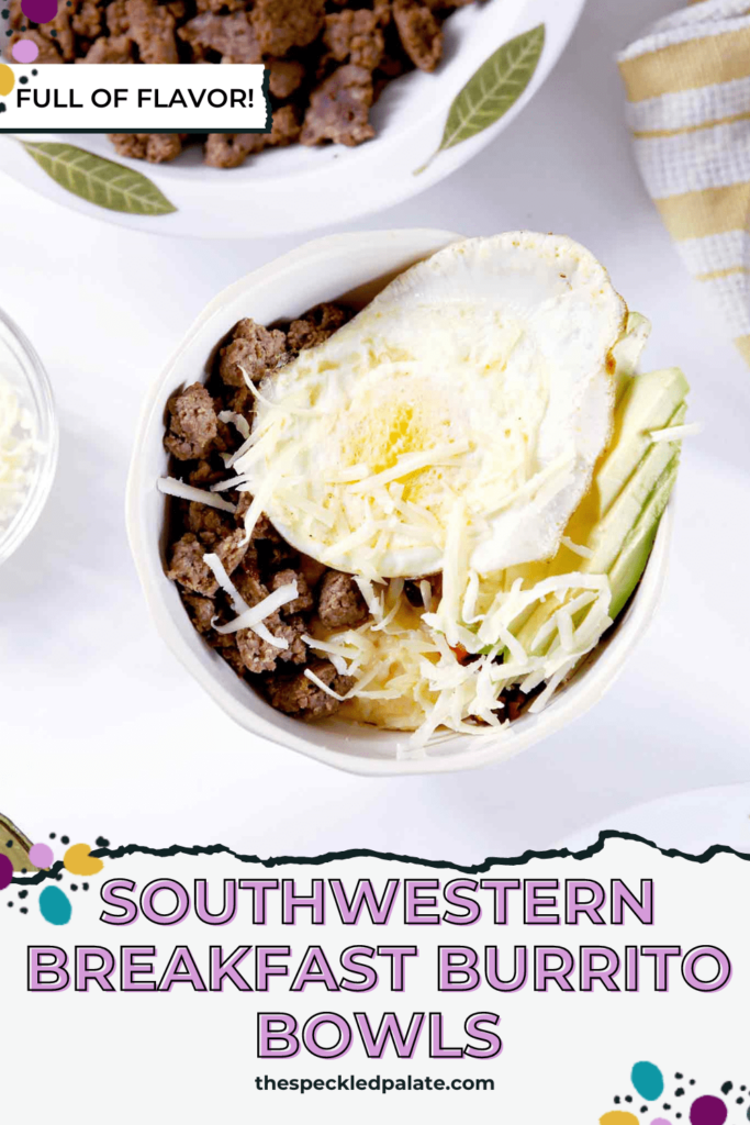 Close up of a breakfast bowl topped with shredded cheese and a fried egg with the text Southwestern Breakfast Burrito Bowl