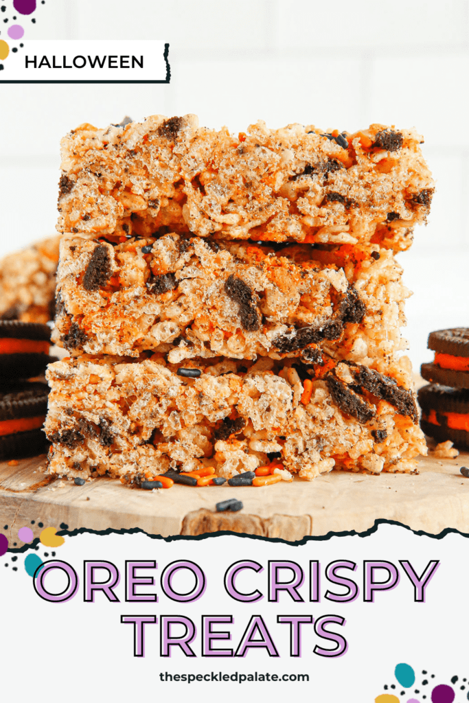 A stack of Halloween Oreo Rice Krispie Treats on wood with the text Oreo Crispy Treats