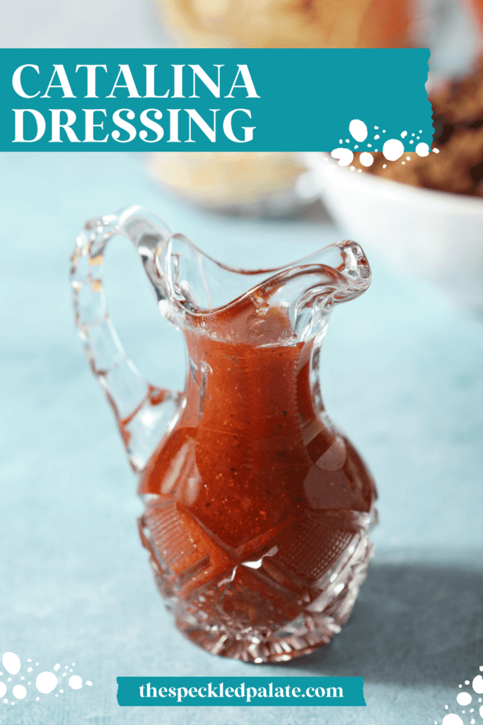 A small glass container holds homemade Catalina dressing beside salad ingredients with the text catalina dressing