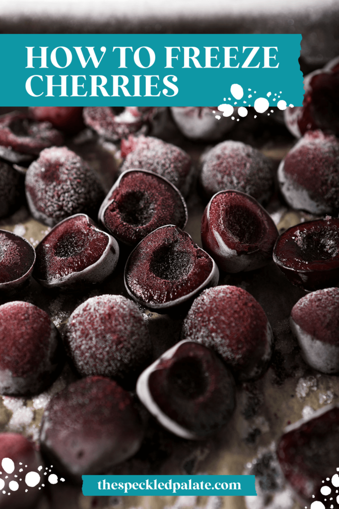 Frozen cherries on a sheet pan with the text how to freeze cherries