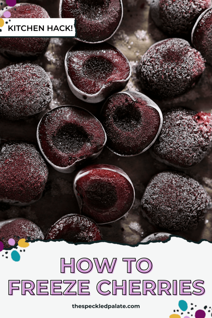 Close up of frozen cherries on a sheet pan with the text How to Freeze Cherries