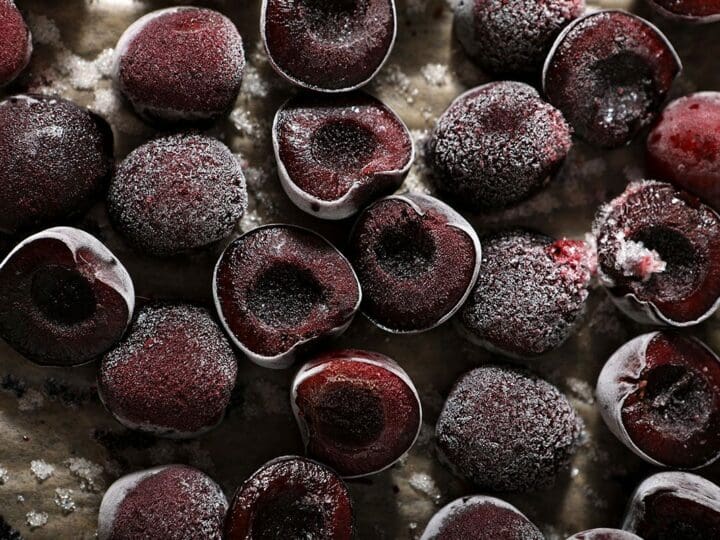 Frozen cherries on a sheet pan