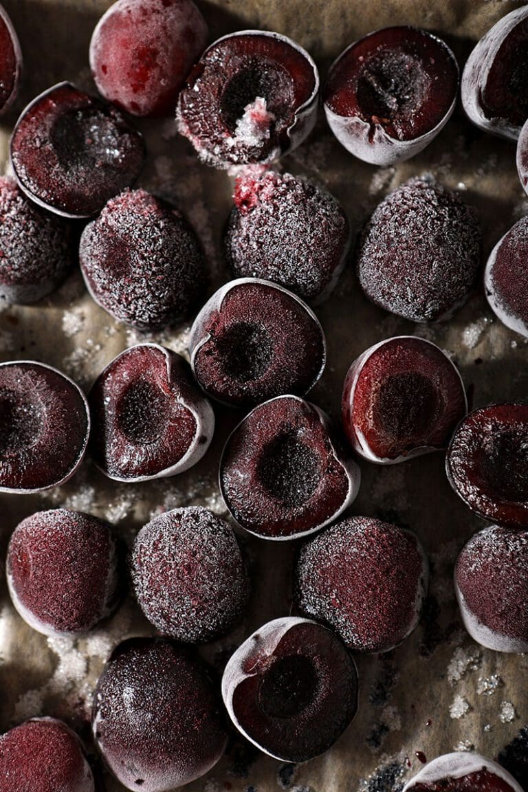 Frozen cherries on a sheet pan