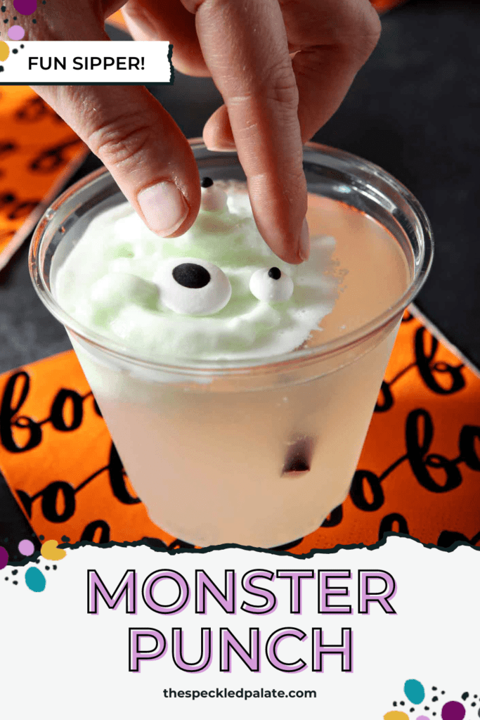 A woman drops candy eyes onto Melting Monster Halloween Punch with the text monster punch