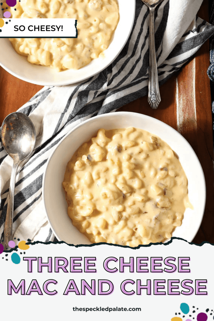 Two bowls of macaroni and cheese in white bowls next to spoons with the text three cheese Mac and cheese