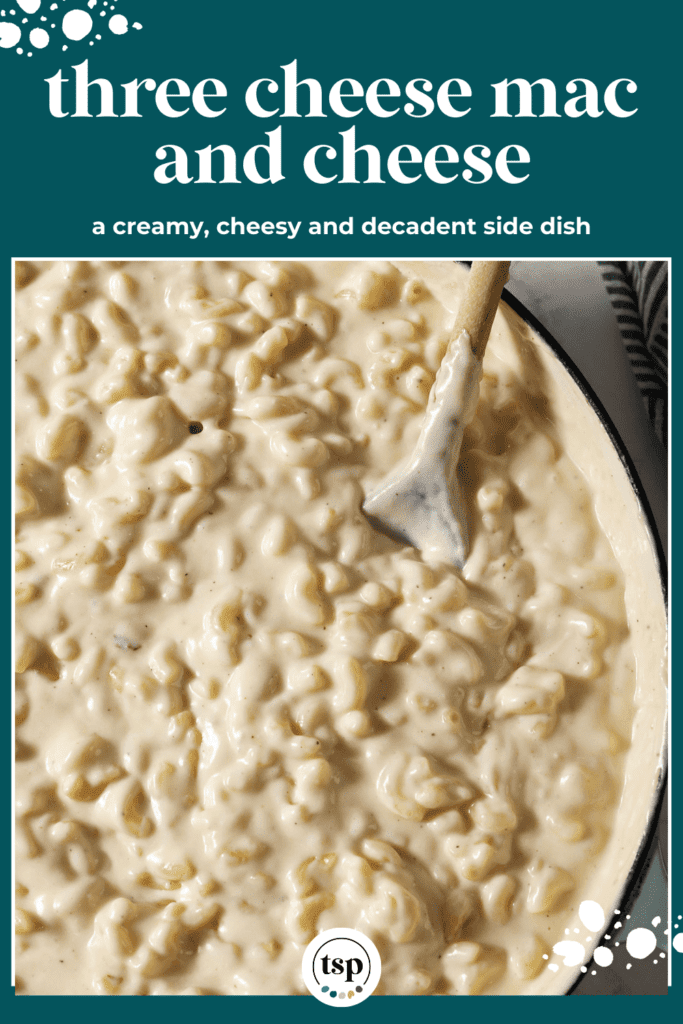 A spoon nestles into a pan of Mac n cheese with the text three cheese Mac and cheese a creamy, cheesy and decadent side dish