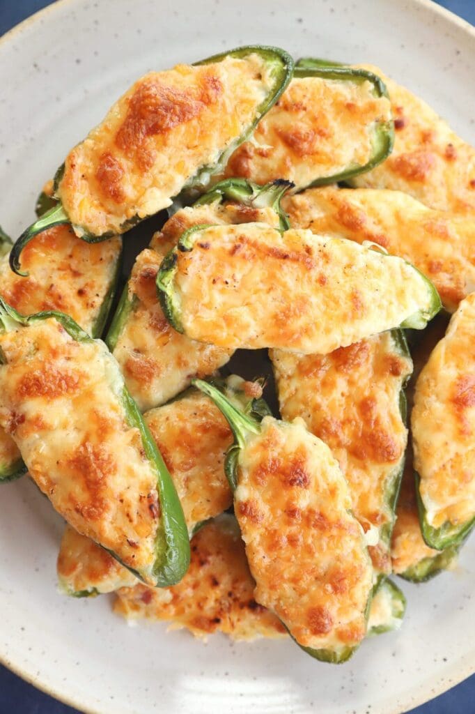 A white platter of jalapeno poppers from above