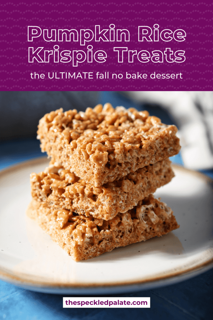 A stack of three orange rice krispie treats on a white plate with the text Pumpkin Rice Krispie Treats the ultimate fall no bake treat