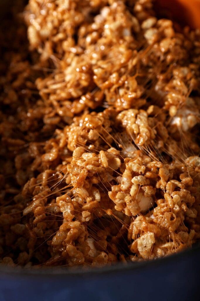 Pumpkin Spice Rice Krispie Treats after stirring in a pan