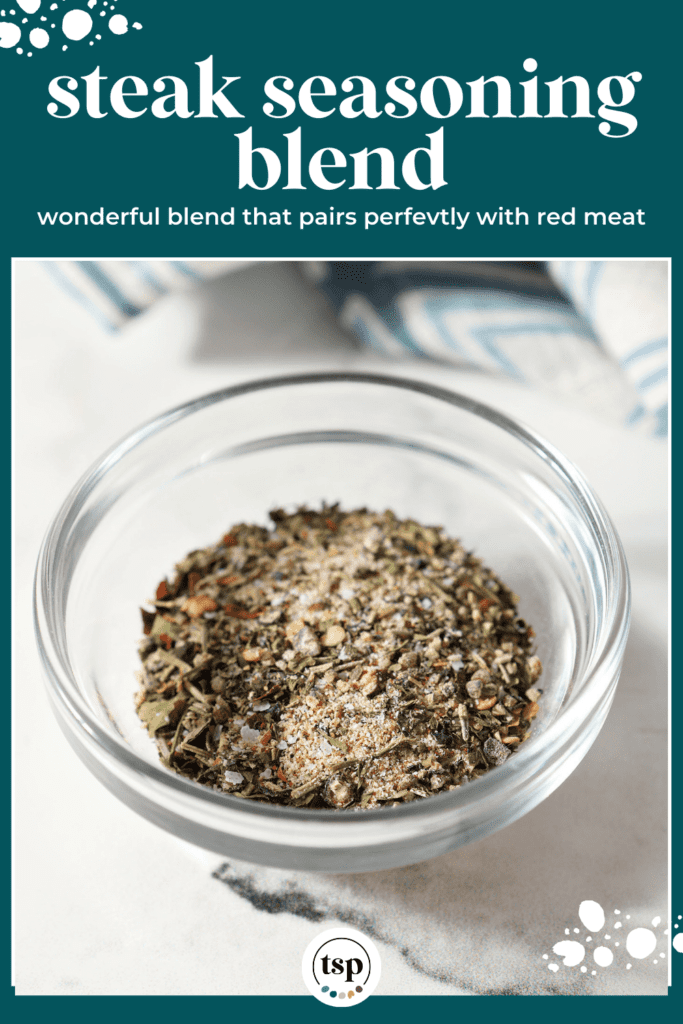 A small batch steak seasoning blend in a glass bowl on marble with the text steak seasoning blend wonderful blend that pairs perfectly with red meat