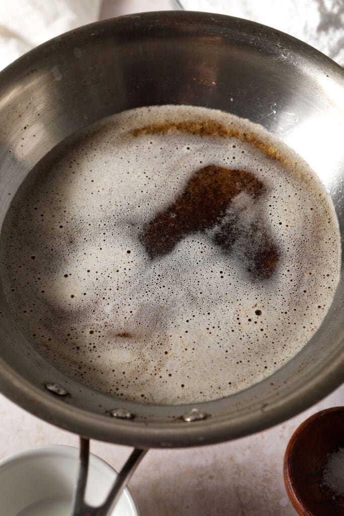 Melted butter in a metal skillet, after browning