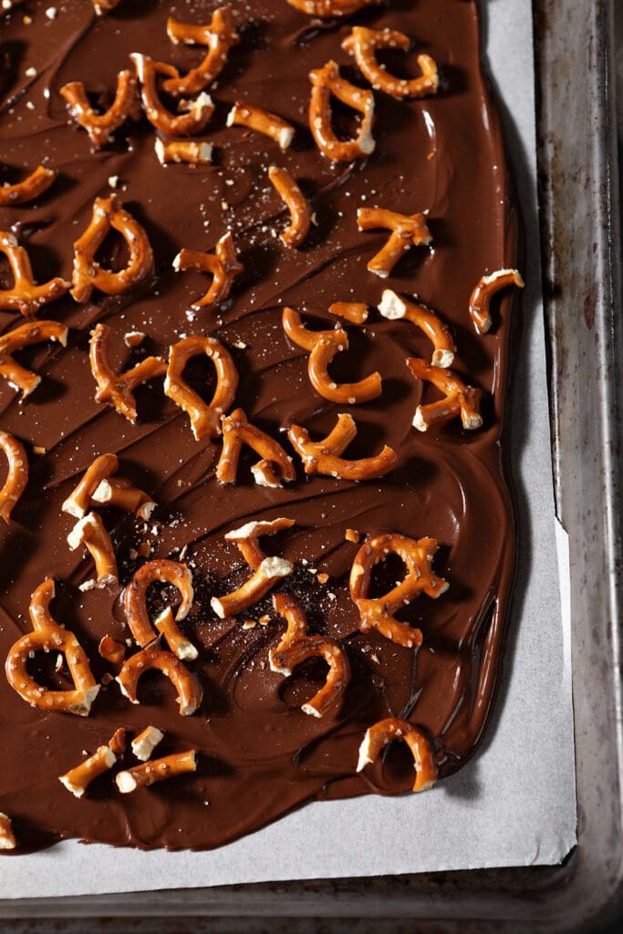 chopped pretzels sprinkled on top of melted chocolate