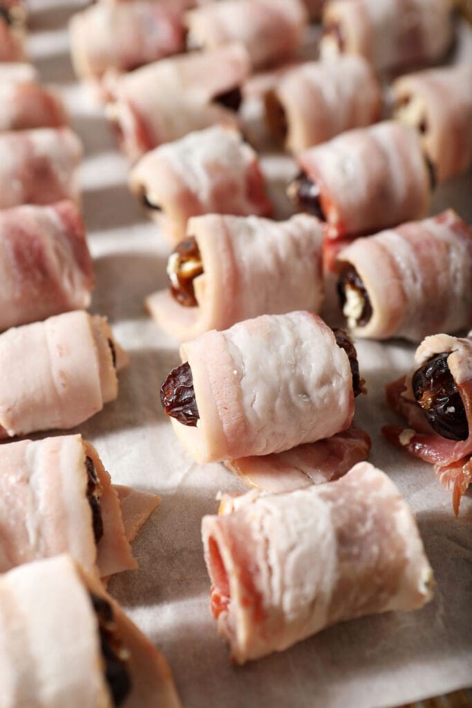 Bacon Wrapped Dates on a sheet pan before baking