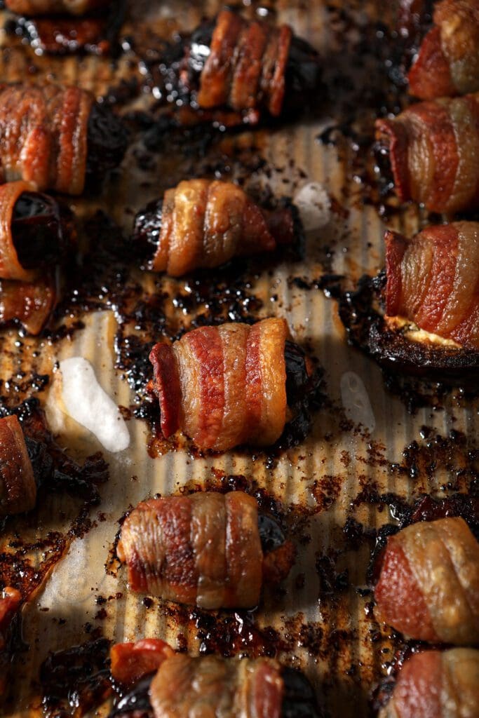 Bacon Wrapped Dates on a sheet pan after baking