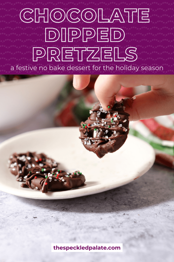 A child picks up a chocolate covered pretzel from a plate with the text chocolate dipped pretzels a festive no bake dessert for the holiday season