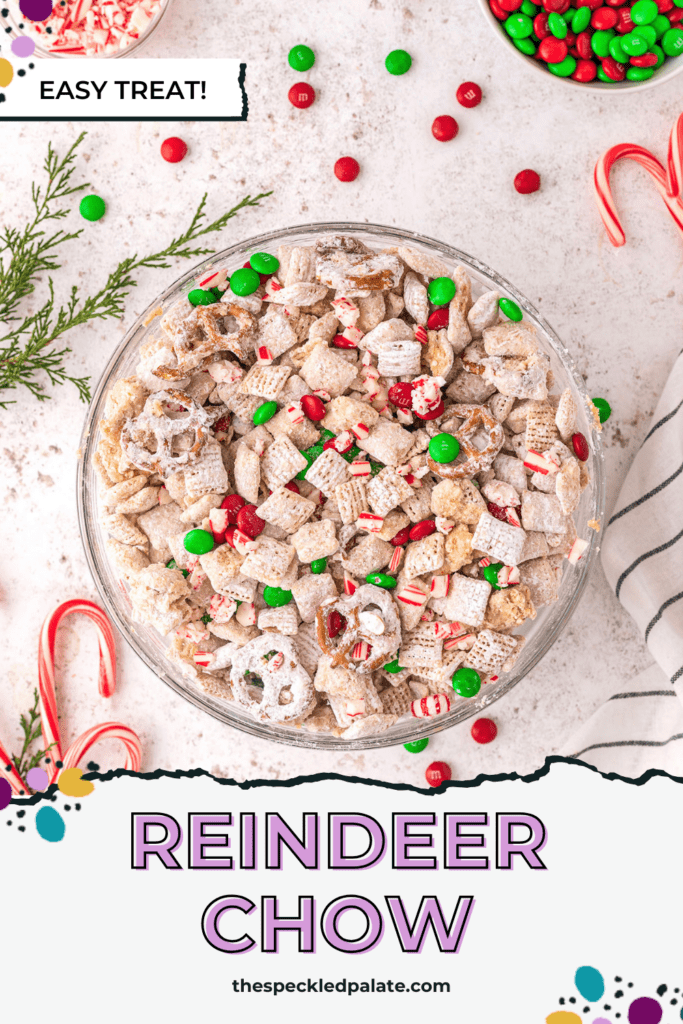 A bowl of reindeer chow with colorful M&Ms and peppermints on a white background surrounded by more Christmas candy with the text reindeer chow