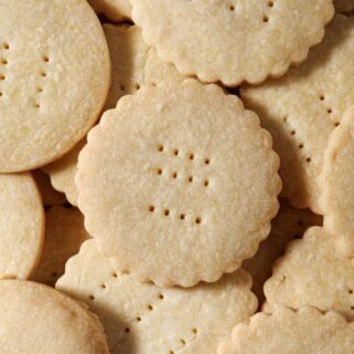 Close up of stacked round shortbread cookies