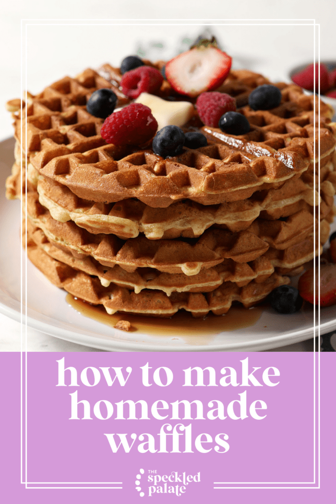 A stack of waffles on a white plate topped with berries with the text how to make homemade waffles