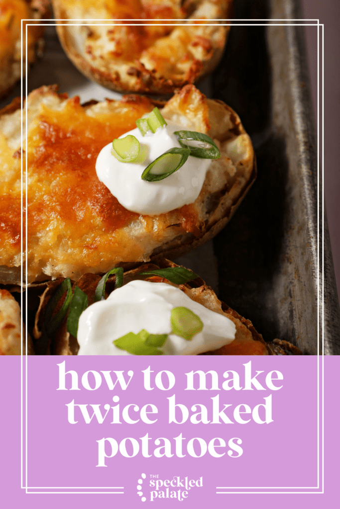 Close up of a few twice baked potatoes on a metal pan garnished with sour cream and scallions with the text how to make twice baked potatoes