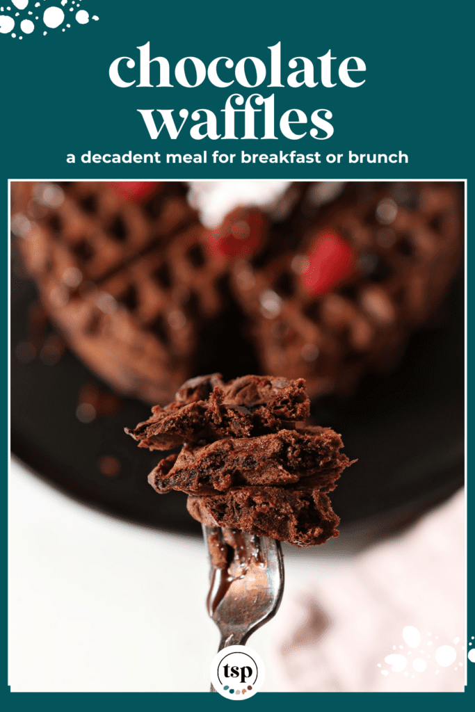 A fork holds bites of a chocolate waffle above a black plate of waffles topped with whipped cream and berries with the text chocolate waffles a decadent meal for breakfast or brunch