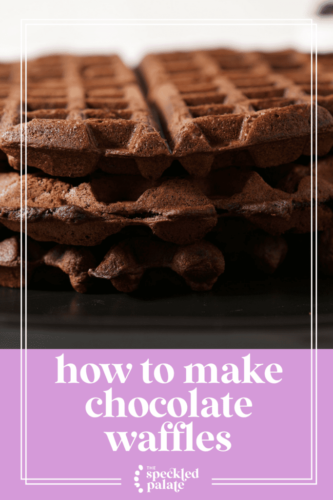 A stack of three chocolate waffles on a black plate with the text how to make chocolate waffles