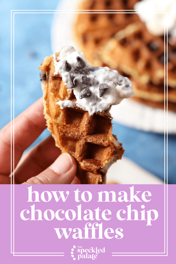 a hand holds a bitten-into waffle dipped in whipped cream and covered in chocolate chips over a plate holding another waffle on a blue surface with the text how to make chocolate chip waffles