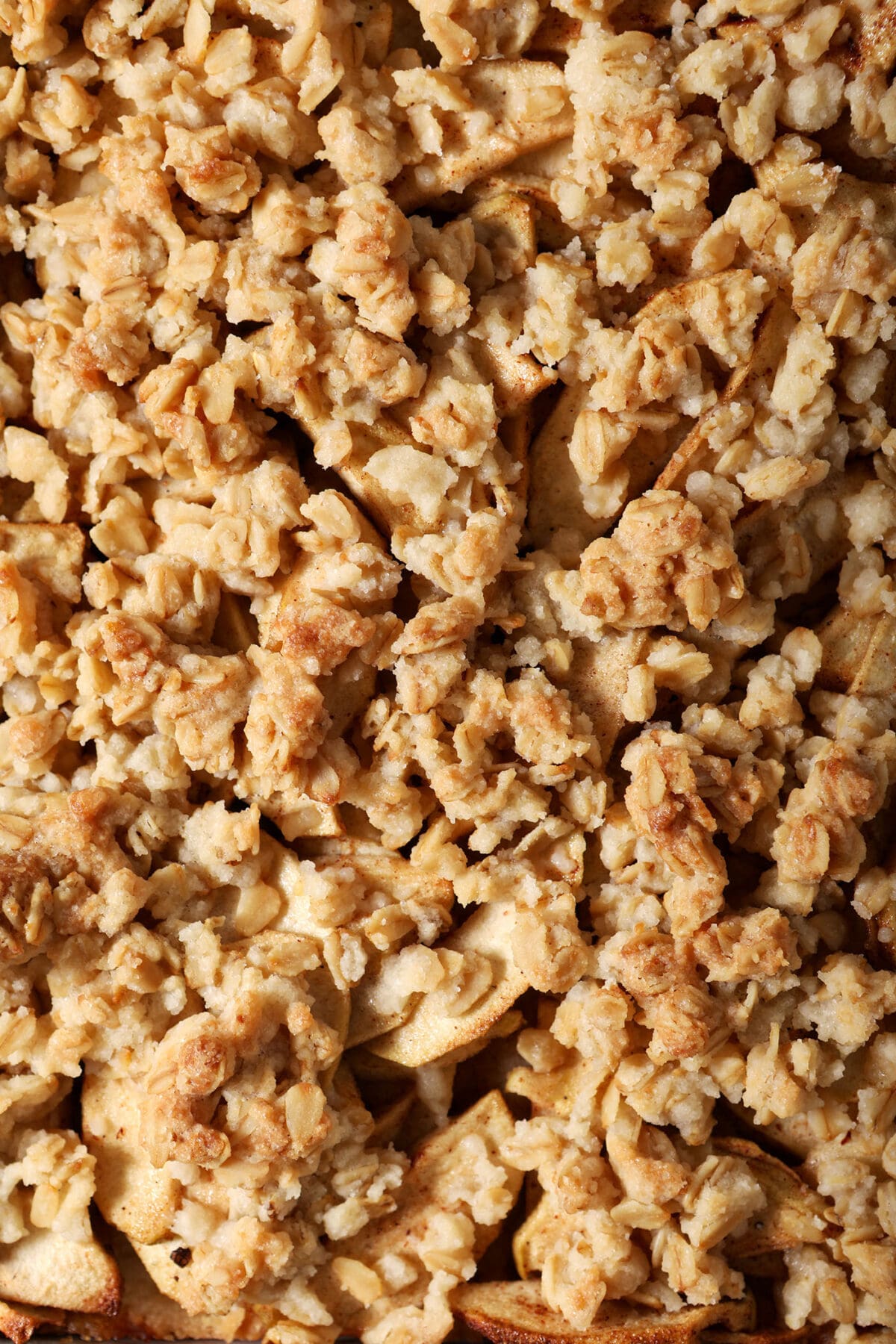 Close up of crumb topping on apple pie bars