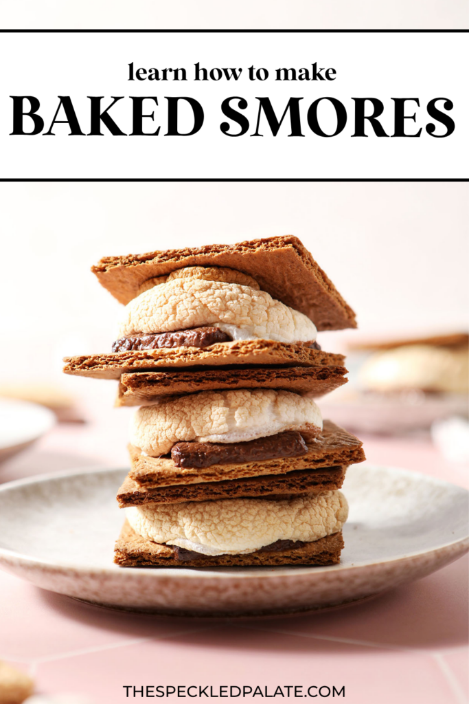 a stack of three s'mores on a grey plate with the text learn how to make baked smores