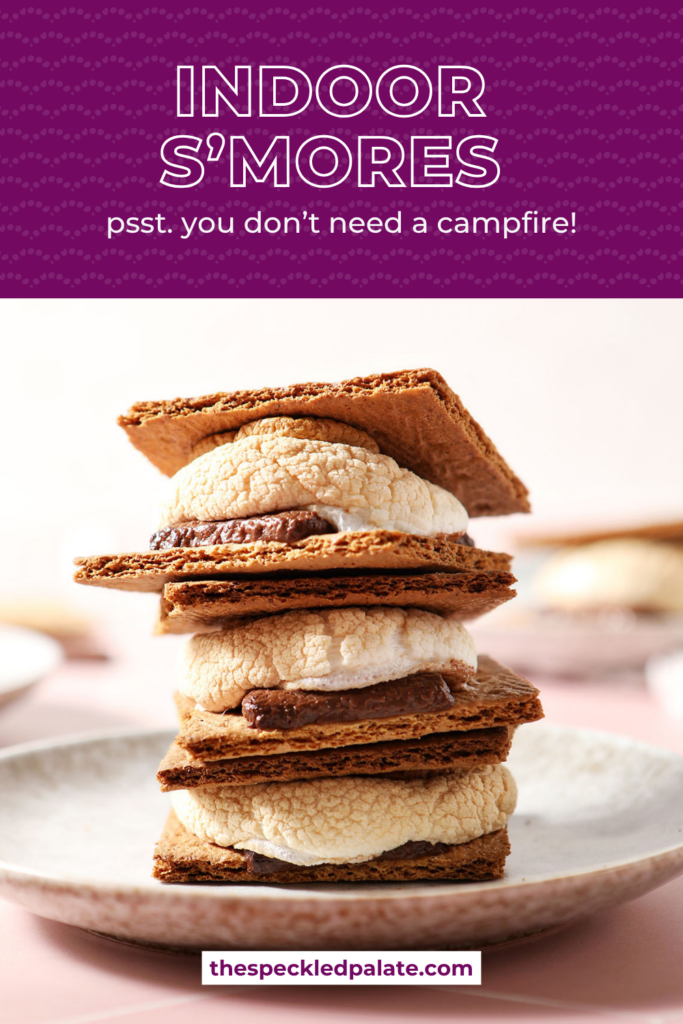 a stack of three s'mores on a grey plate with the text indoor s'mores psst, you don't need a campfire!